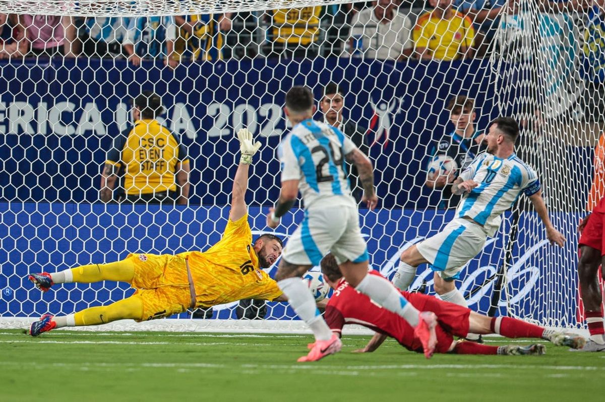 Jul 9, 2024; East Rutherford, NJ, USA; Argentina forward Lionel Messi (10) scores a goal past Canada goalkeeper Maxime Crepeau (16) during the second half at Metlife Stadium. Mandatory Credit: Vincent Carchietta-USA TODAY Sports