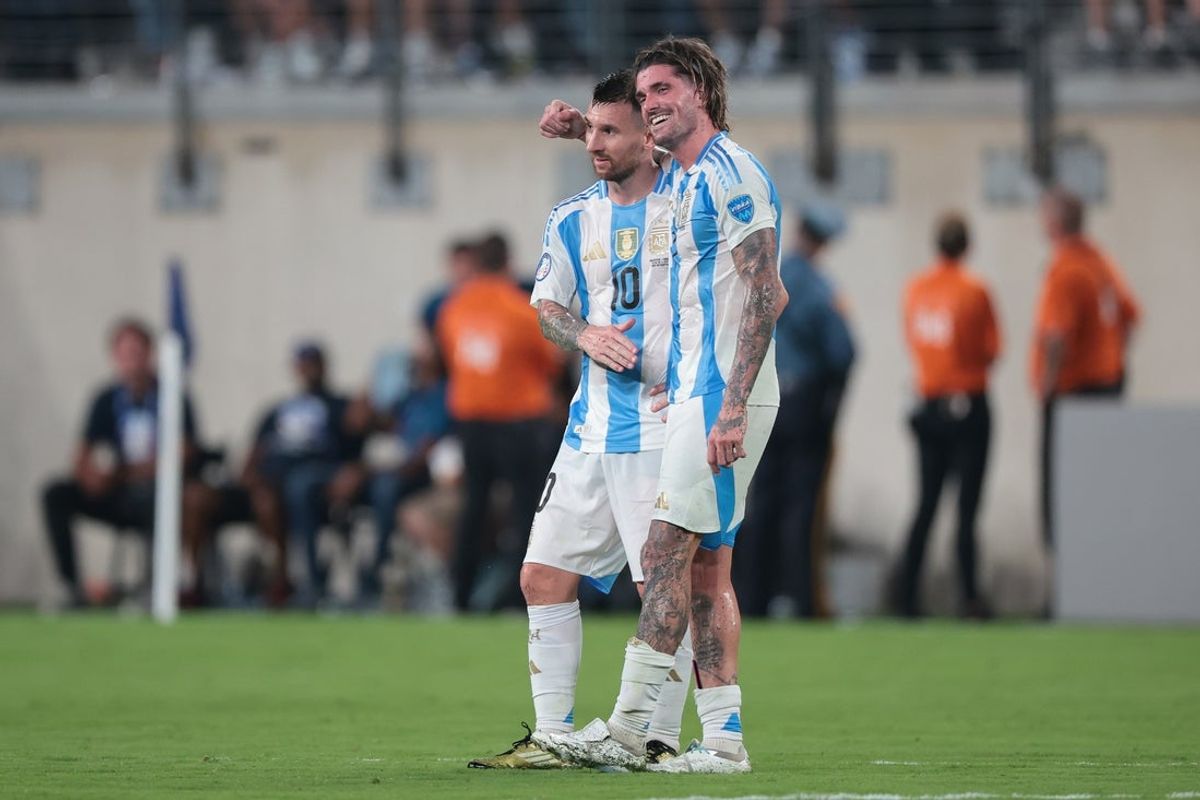Jul 9, 2024; East Rutherford, NJ, USA; Argentina forward Lionel Messi (10) celebrates with midfielder Rodrigo De Paul (7) during the second half against Canada at Metlife Stadium. Mandatory Credit: Vincent Carchietta-Imagn Images