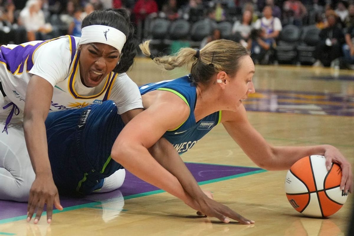 Jul 9, 2024; Los Angeles, California, USA; LA Sparks forward Rickea Jackson (2) and Minnesota Lynx forward Alanna Smith (8) battle for the ball in the second half at Crypto.com Arena. Mandatory Credit: Kirby Lee-USA TODAY Sports