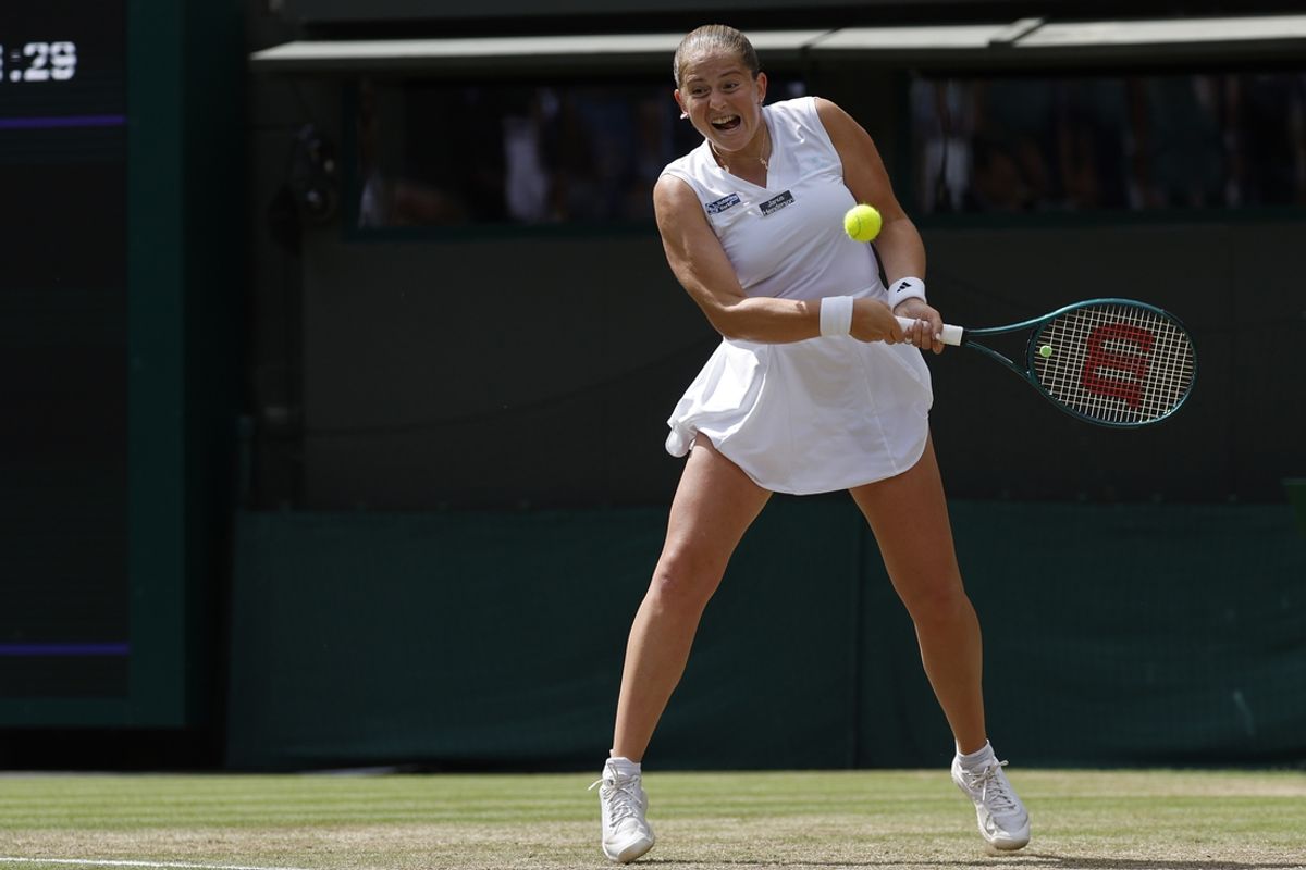 Jul 10, 2024; London, United Kingdom; Jelena Ostapenko (LAT) hits a backhand against Barbora Krejcikova (CZE)(not pictured) in a ladies' singles quarter final match of The Championships Wimbledon 2024 at The All England Lawn Tennis Club. Mandatory Credit: Geoff Burke-USA TODAY Sports
