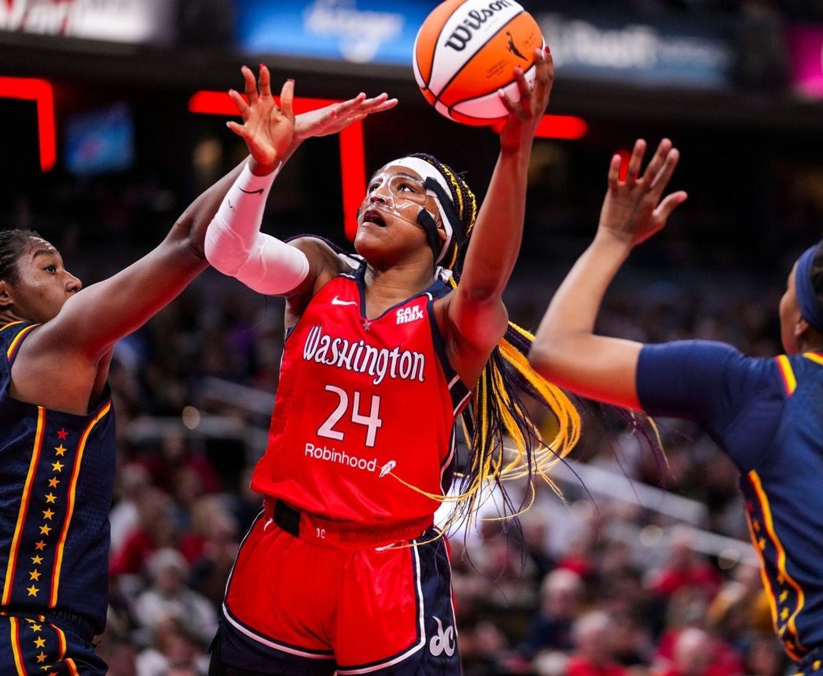 Washington Mystics forward Aaliyah Edwards (24) goes up for a shot Wednesday, July 10, 2024, during the game at Gainbridge Fieldhouse in Indianapolis.