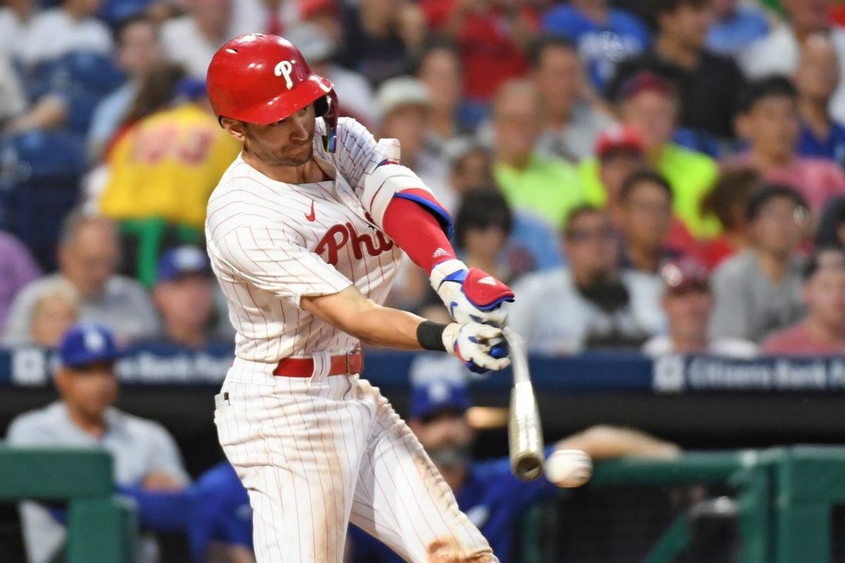 Jul 10, 2024; Philadelphia, Pennsylvania, USA; Philadelphia Phillies shortstop Trea Turner (7) hits an RBI single during the fifth inning against the Los Angeles Dodgers at Citizens Bank Park. Mandatory Credit: Eric Hartline-USA TODAY Sports