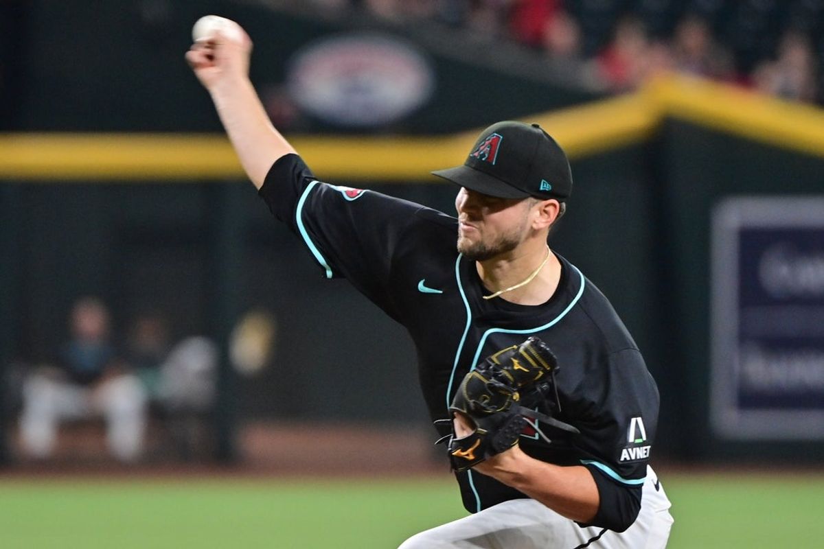 Jul 10, 2024; Phoenix, Arizona, USA;  Arizona Diamondbacks pitcher Slade Cecconi (43) throws in the first inning against the Atlanta Braves at Chase Field. Mandatory Credit: Matt Kartozian-Imagn Images