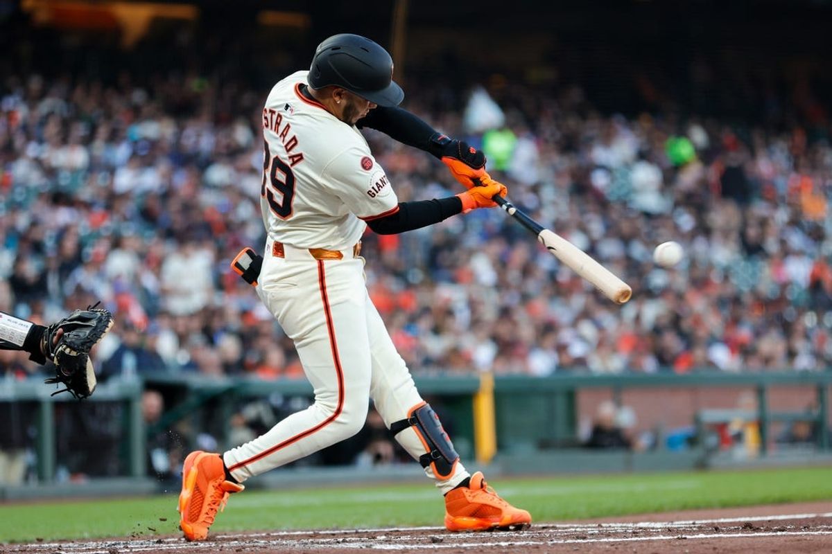 Jul 10, 2024; San Francisco, California, USA; San Francisco Giants second baseman Thairo Estrada (39) hits a RBI single during the first inning against the Toronto Blue Jays at Oracle Park. Mandatory Credit: Sergio Estrada-USA TODAY Sports