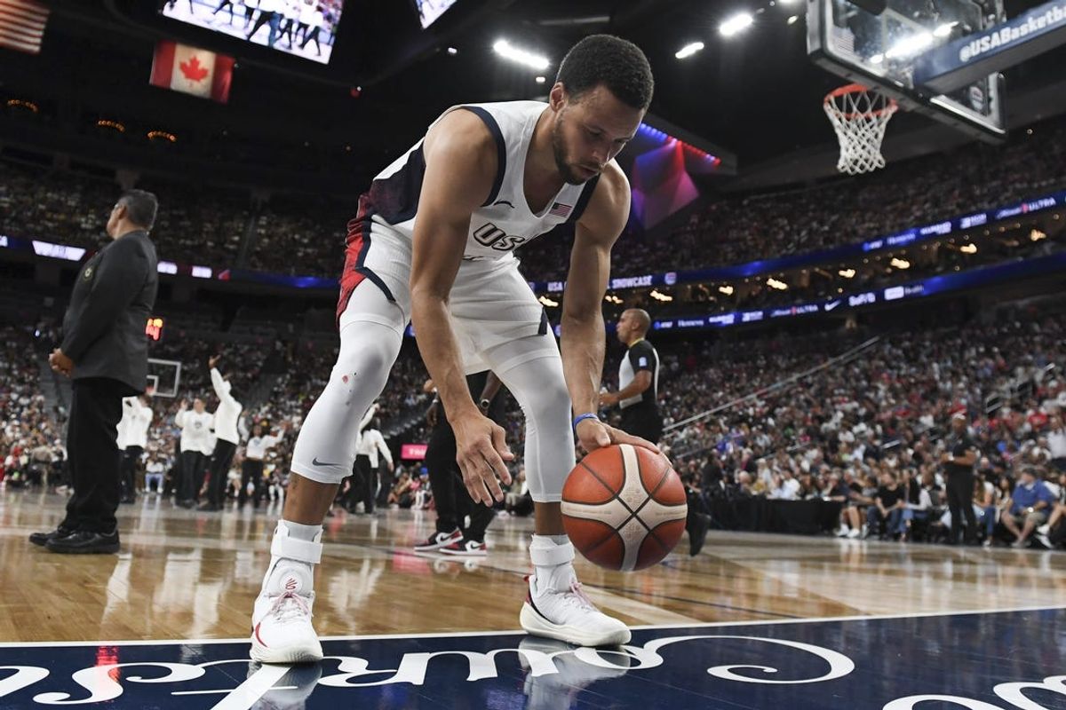 USA guard Stephen Curry (4) practices his dribbling during a timeout against Canada in the fourth quarter of the USA Basketball Showcase at T-Mobile Arena. Mandatory Credit: Candice Ward-USA TODAY Sports