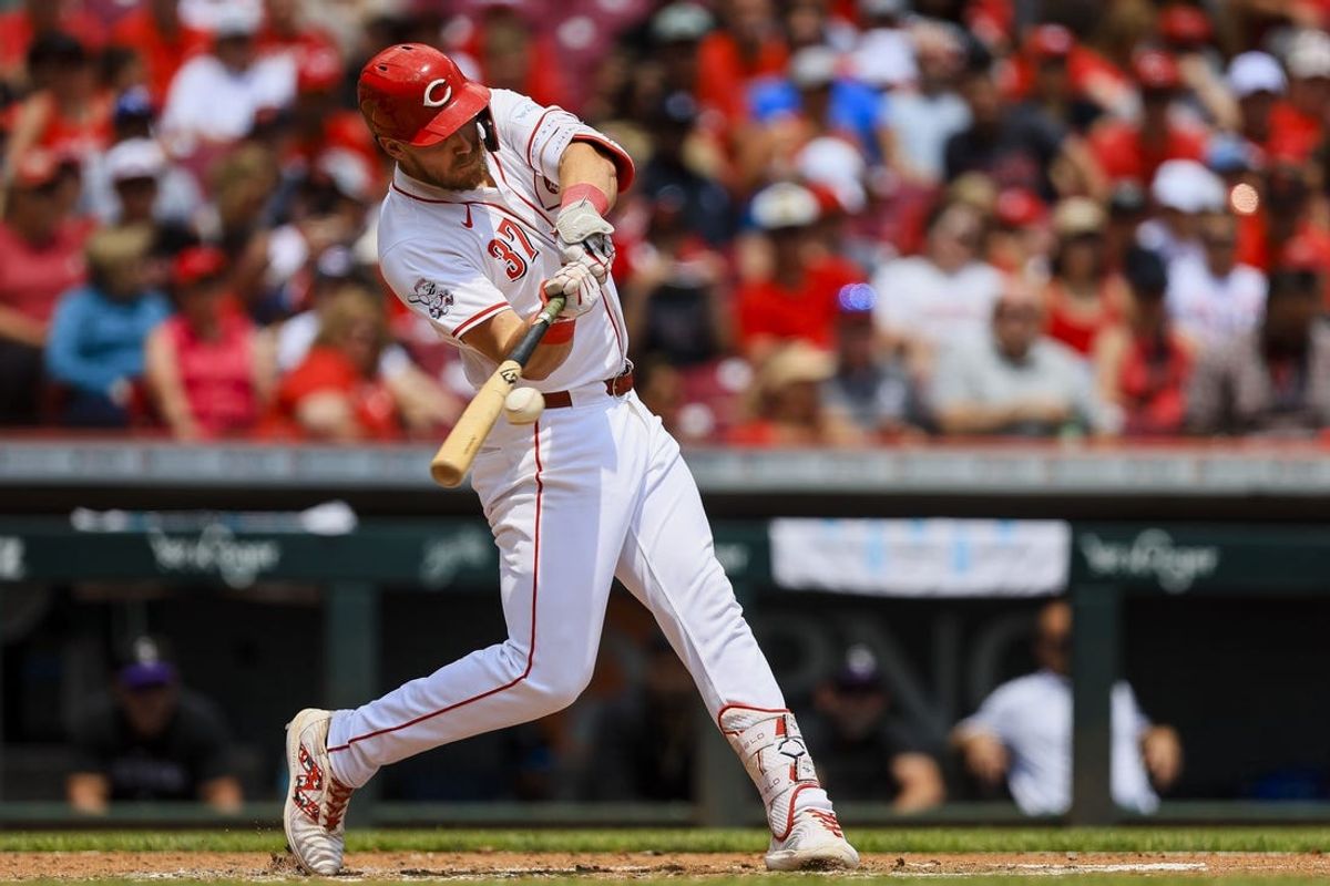 Jul 11, 2024; Cincinnati, Ohio, USA; Cincinnati Reds designated hitter Tyler Stephenson (37) hits a three-run home run in the third inning against the Colorado Rockies at Great American Ball Park. Mandatory Credit: Katie Stratman-USA TODAY Sports