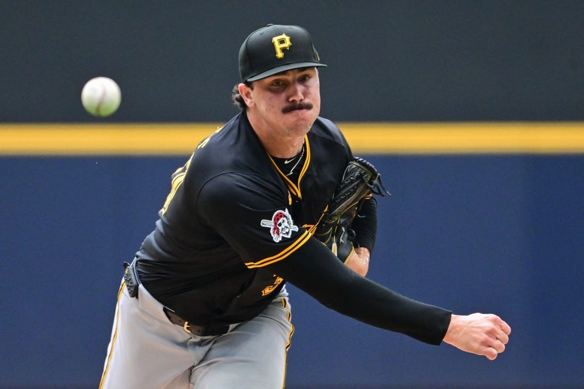 Jul 11, 2024; Milwaukee, Wisconsin, USA; Pittsburgh Pirates starting pitcher Paul Skenes (30) pitches in the first inning against the Milwaukee Brewers at American Family Field. Mandatory Credit: Benny Sieu-USA TODAY Sports
