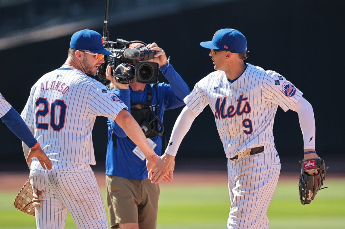 Jul 11, 2024; New York City, New York, USA; New York Mets first baseman Pete Alonso (20) and left fielder Brandon Nimmo (9) celebrate after defeating the Washington Nationals at Citi Field. Mandatory Credit: Vincent Carchietta-USA TODAY Sports