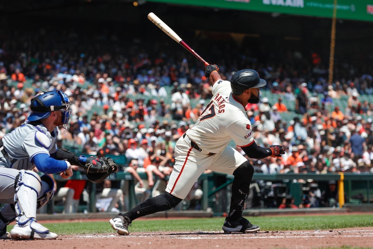 Jul 11, 2024; San Francisco, California, USA; San Francisco Giants outfielder Heliot Ramos (17) hits a two run home run during the first inning against the Toronto Blue Jays at Oracle Park. Mandatory Credit: Sergio Estrada-USA TODAY Sports