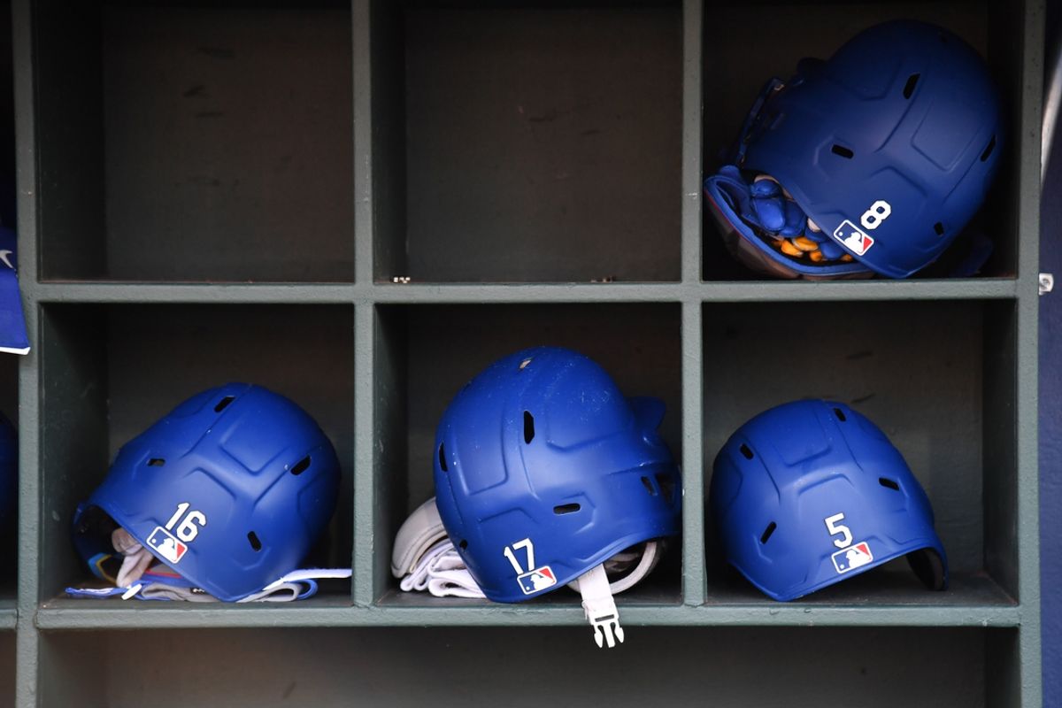 Jul 10, 2024; Philadelphia, Pennsylvania, USA; Los Angeles Dodgers' batting helmets in the dugout at Citizens Bank Park. Mandatory Credit: Eric Hartline-Imagn Images