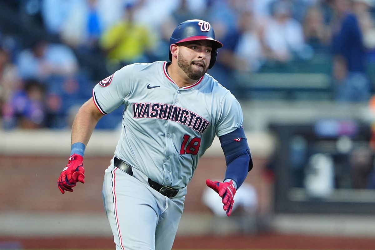 Jul 10, 2024; New York City, New York, USA; Washington Nationals first baseman Juan Yepez (18) runs out an RBI single against the New York Mets during the fourth inning at Citi Field. Mandatory Credit: Gregory Fisher-USA TODAY Sports