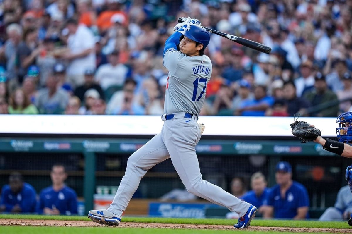 L. A. Dodgers designated hitter Shohei Ohtani (17) bats against Detroit Tigers during the fifth inning at Comerica Park in Detroit on Friday, July 12, 2024.