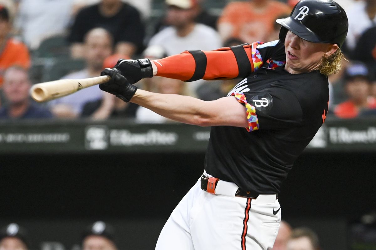 Jul 12, 2024; Baltimore, Maryland, USA; Baltimore Orioles outfielder Heston Kjerstad (13) swings through a second inning single against the New York Yankees  at Oriole Park at Camden Yards. Mandatory Credit: Tommy Gilligan-Imagn Images