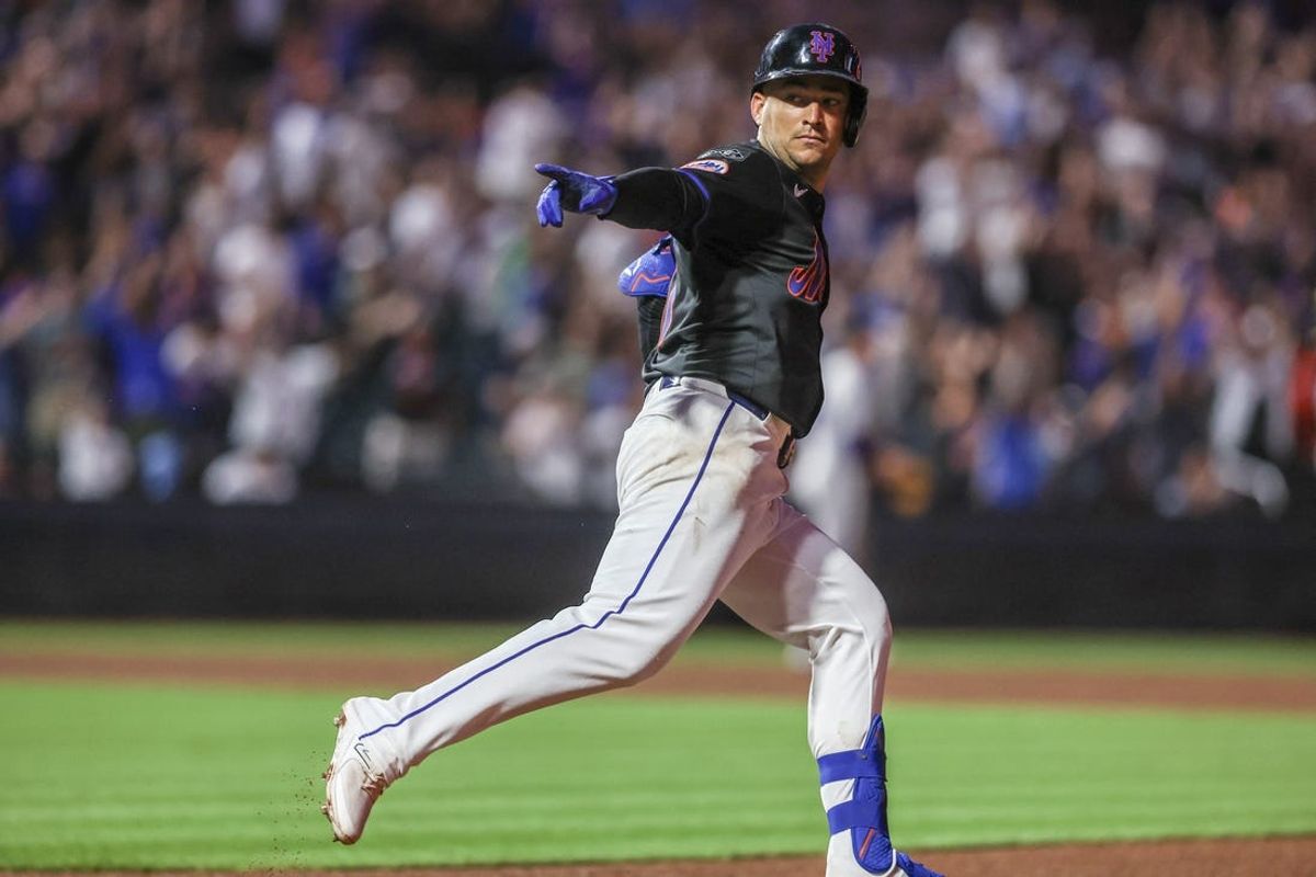 Jul 12, 2024; New York City, New York, USA;  New York Mets second baseman Jose Iglesias (11) hits a solo home run in the fifth inning against the Colorado Rockies at Citi Field. Mandatory Credit: Wendell Cruz-USA TODAY Sports