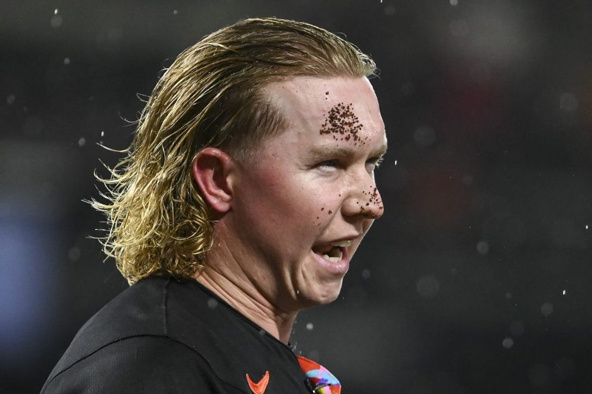 Jul 12, 2024; Baltimore, Maryland, USA;  Baltimore Oriolesoutfielder Heston Kjerstad (13) stands on the field after being  hit by a pitch in the head during the ninth inning against the New York Yankees at Oriole Park at Camden Yards. Mandatory Credit: Tommy Gilligan-USA TODAY Sports