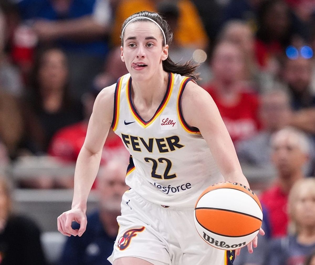 Indiana Fever guard Caitlin Clark rushes up the court during a game against the Phoenix Mercury on July 12, 2024.