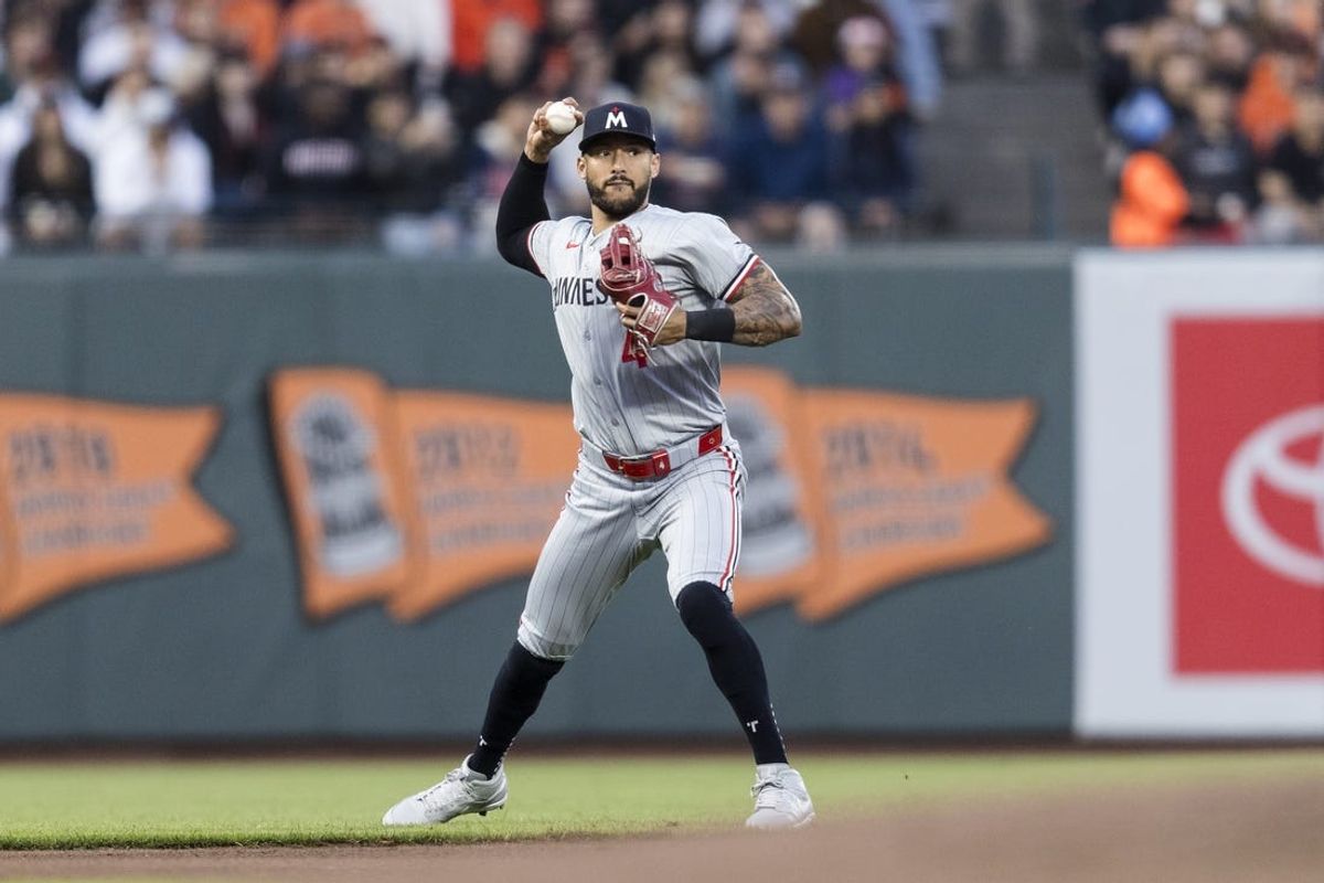 Jul 12, 2024; San Francisco, California, USA; Minnesota Twins shortstop Carlos Correa (4) throws to first base for an out against the San Francisco Giants during the fourth inning at Oracle Park. Mandatory Credit: John Hefti-USA TODAY Sports