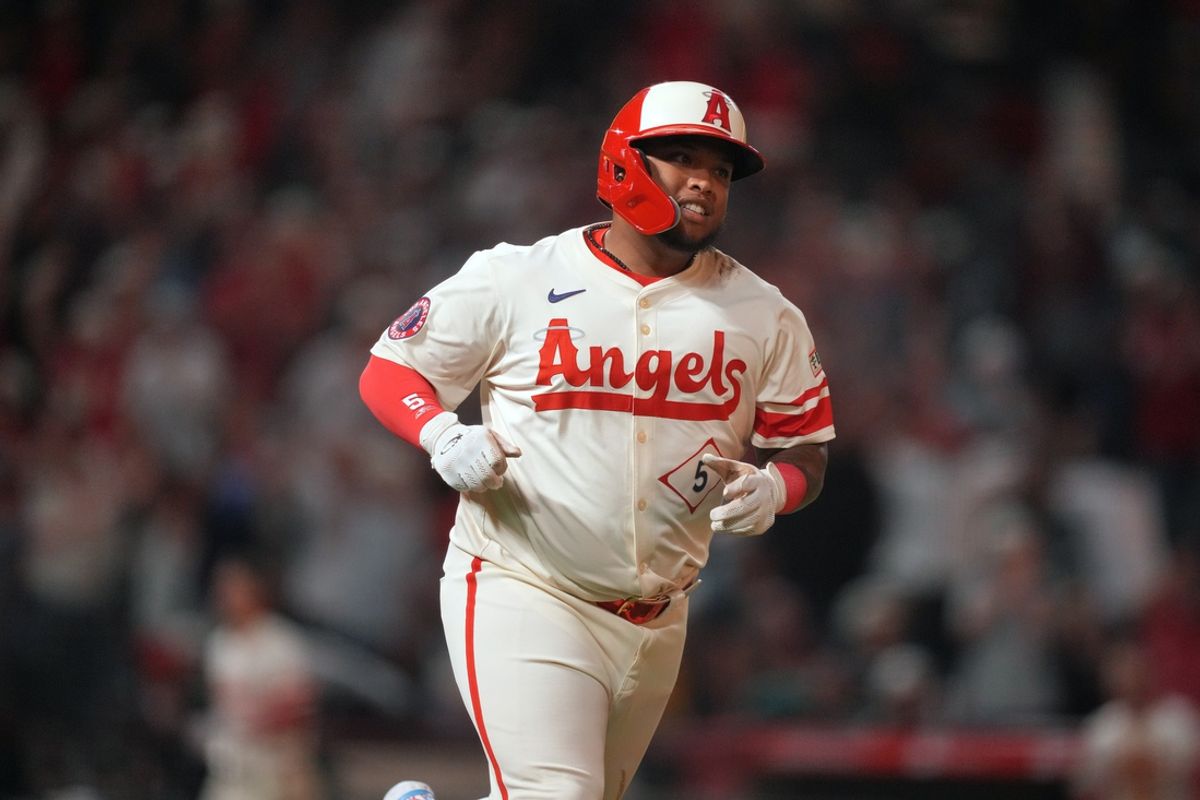 Jul 12, 2024; Anaheim, California, USA; Los Angeles Angels designated hitter Willie Calhoun (5) runs the bases after hitting a two-run walkoff home run in the 10th inning against the Seattle Mariners at Angel Stadium. Mandatory Credit: Kirby Lee-USA TODAY Sports