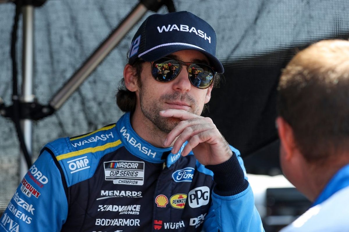 Jul 13, 2024; Long Pond, Pennsylvania, USA; NASCAR Cup Series driver Ryan Blaney looks on during practice and qualifying for the The Great American Getaway 400 at Pocono Raceway. Mandatory Credit: Matthew O'Haren-USA TODAY Sports