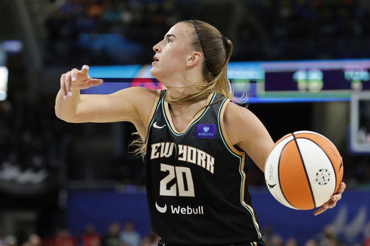 Jul 13, 2024; Chicago, Illinois, USA; New York Liberty guard Sabrina Ionescu (20) drives to the basket against the Chicago Sky during the first half of a WNBA game at Wintrust Arena. Mandatory Credit: Kamil Krzaczynski-USA TODAY Sports