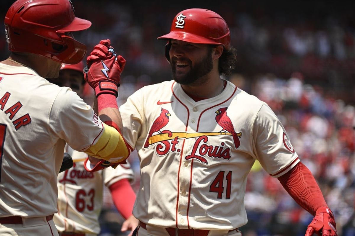 Jul 13, 2024; St. Louis, Missouri, USA; St. Louis Cardinals first baseman Alec Burleson (41) celebrates with teammates after hitting a 3-run homer against the Chicago Cubs during the first inning at Busch Stadium. Mandatory Credit: Jeff Le-USA TODAY Sports