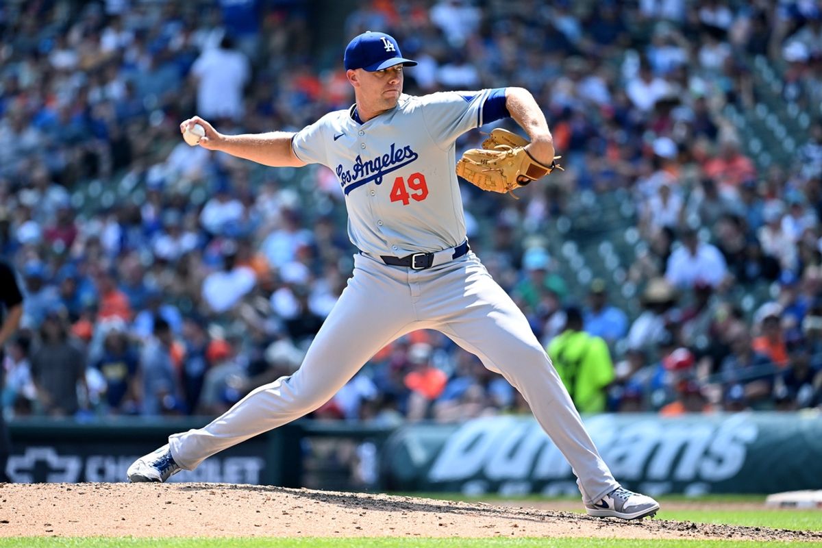 Jul 13, 2024; Detroit, Michigan, USA; Los Angeles Dodgers pitcher Blake Treinen (49) throws a pitch against the Detroit Tigers in the seventh inning at Comerica Park. Mandatory Credit: Lon Horwedel-USA TODAY Sports
