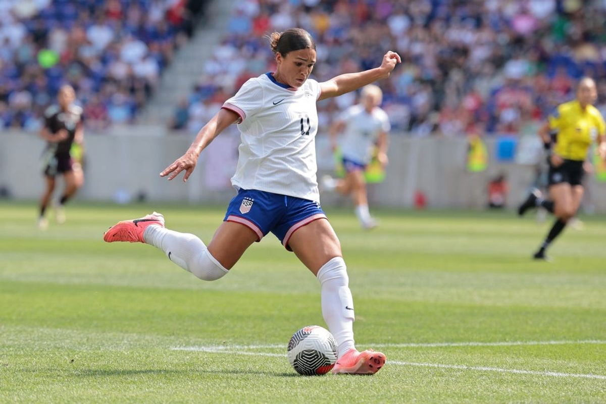 Jul 13, 2024; Harrison, New Jersey, USA; United States forward Sophia Smith (11) kicks the ball against Mexico during the first half at Red Bull Arena. Mandatory Credit: Vincent Carchietta-USA TODAY Sports