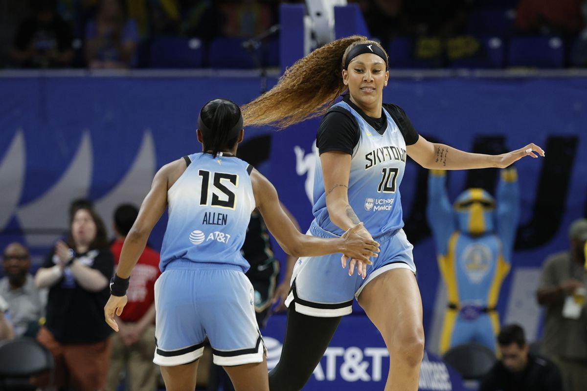 Jul 13, 2024; Chicago, Illinois, USA; Chicago Sky center Kamilla Cardoso (10) celebrates with guard Lindsay Allen (15) after scoring against the New York Liberty during the first half of a WNBA game at Wintrust Arena. Mandatory Credit: Kamil Krzaczynski-USA TODAY Sports