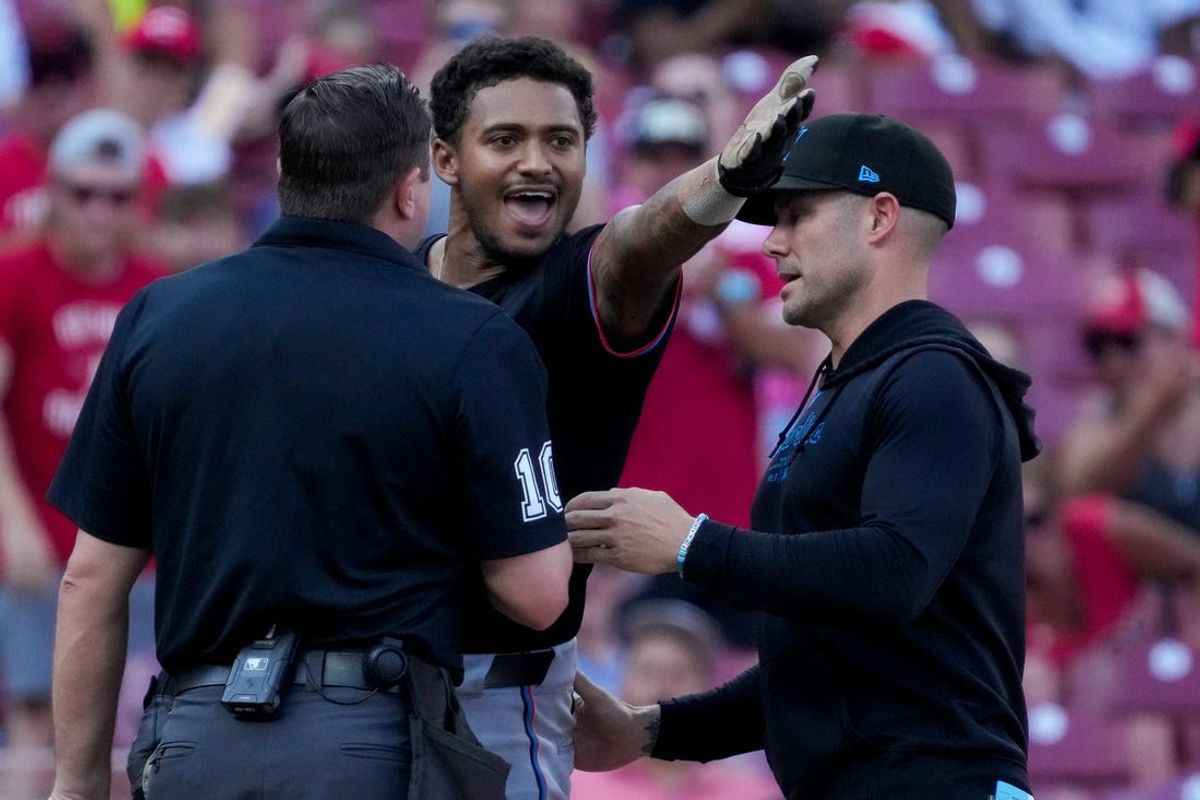 Miami Marlins outfielder Dane Myers (54) is ejected after arguing with home plate umpire Derek Thomas in the eighth inning of the MLB National League game between the Cincinnati Reds and the Miami Marlins at Great American Ball Park in downtown Cincinnati on Saturday, July 13, 2024. The Reds led 1-0 after two innings. The Reds won 10-6.