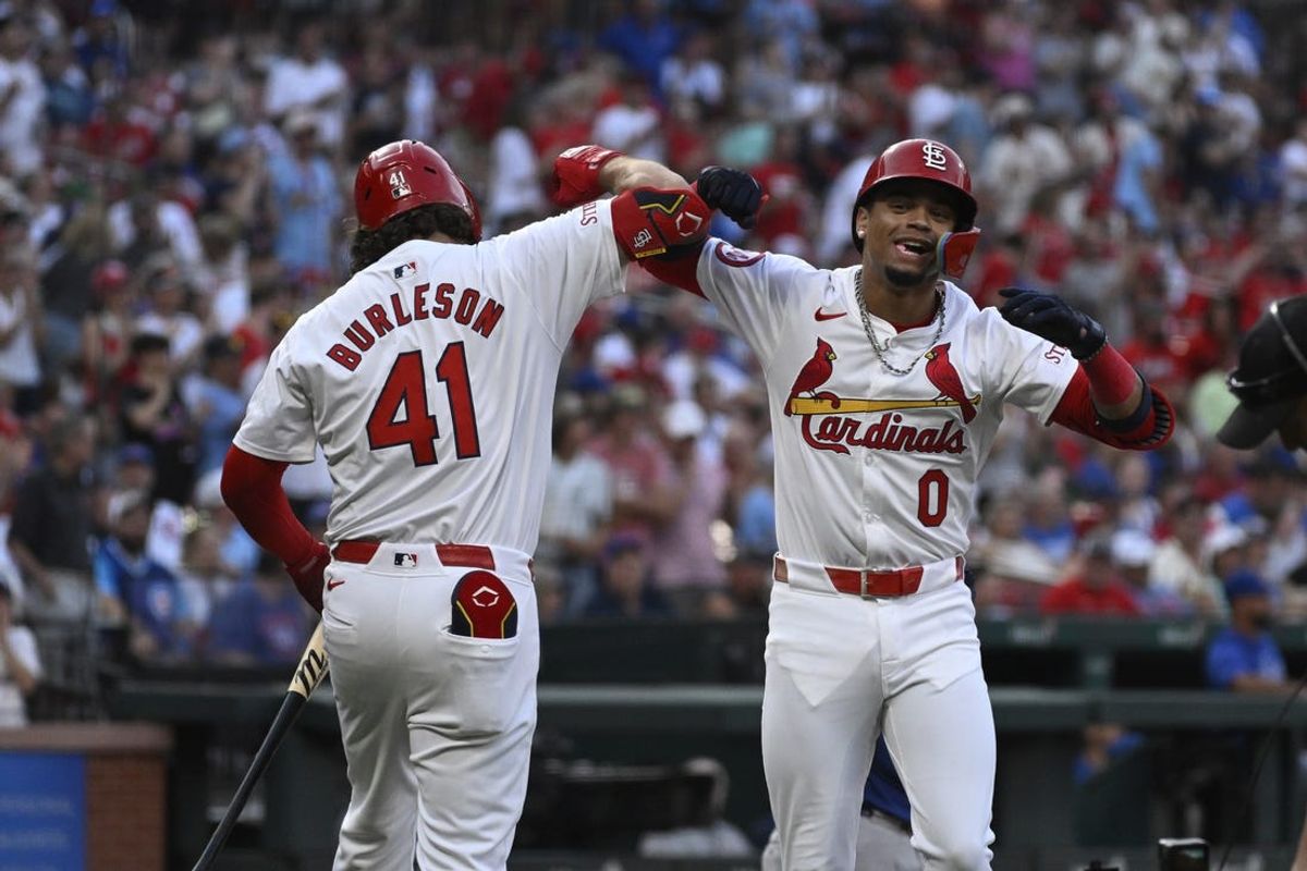 Jul 13, 2024; St. Louis, Missouri, USA; St. Louis Cardinals shortstop Masyn Winn (0) celebrates with first baseman Alec Burleson (41) after hitting a home run against the Chicago Cubs during the first inning at Busch Stadium. Mandatory Credit: Jeff Le-USA TODAY Sports