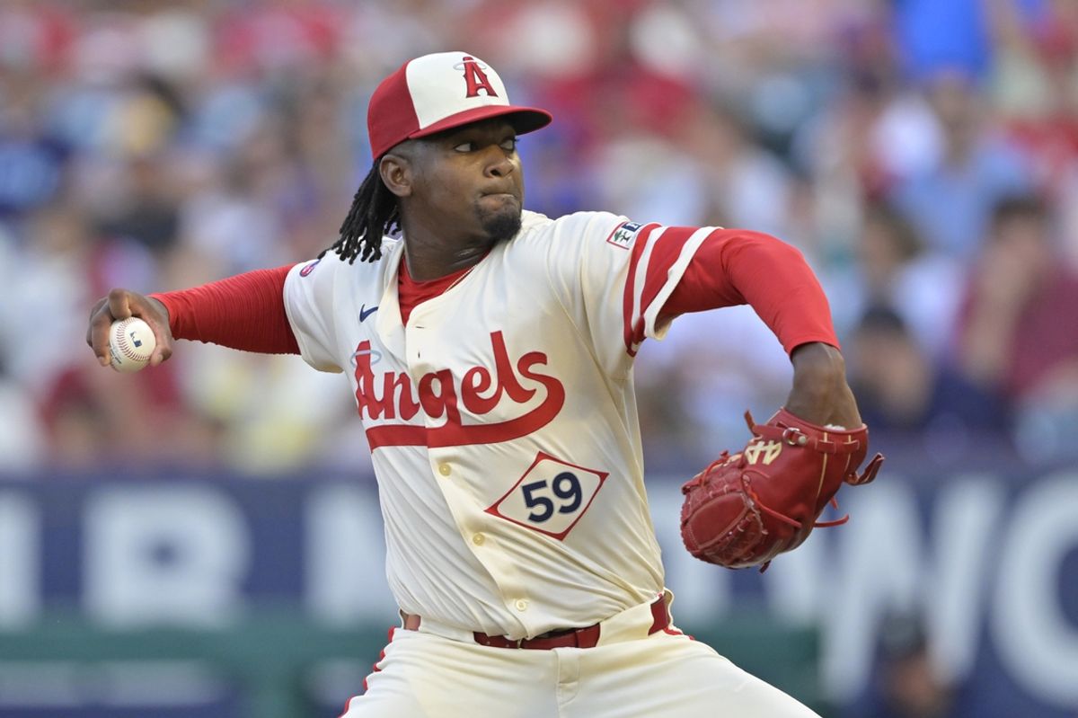 Jul 13, 2024; Anaheim, California, USA;  Jose Soriano #59 of the Los Angeles Angels delivers to the plate in the first inning against the Seattle Mariners at Angel Stadium. Mandatory Credit: Jayne Kamin-Oncea-USA TODAY Sports