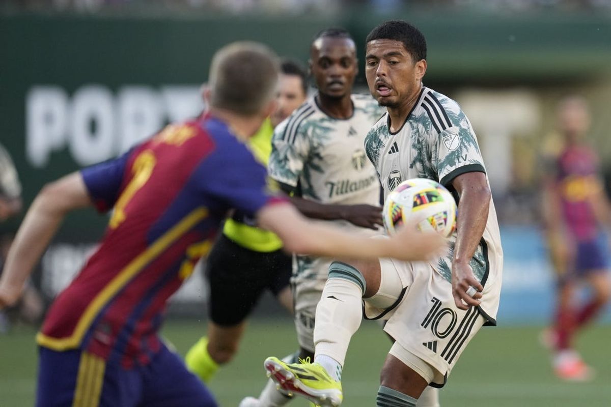 Jul 13, 2024; Portland, Oregon, USA;  Portland Timbers midfielder Evander (10) passes the ball during the first half against Real Salt Lake at Providence Park. Mandatory Credit: Soobum Im-USA TODAY Sports