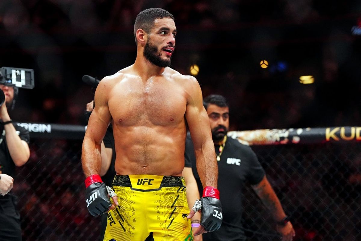 Jul 13, 2024; Denver, Colorado, USA; Gabriel Bonfim (red gloves) reacts after his fight against Ange Loosa (blue gloves) during UFC Fight Night at Ball Arena. Mandatory Credit: Ron Chenoy-Imagn Images