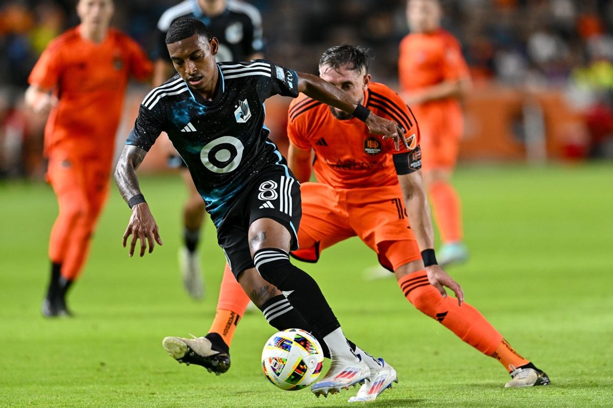 Jul 13, 2024; Houston, Texas, USA; Minnesota United midfielder Joseph Rosales (8) controls the ball during the second half against Houston Dynamo FC at Shell Enegry Stadium. Mandatory Credit: Maria Lysaker-USA TODAY Sports
