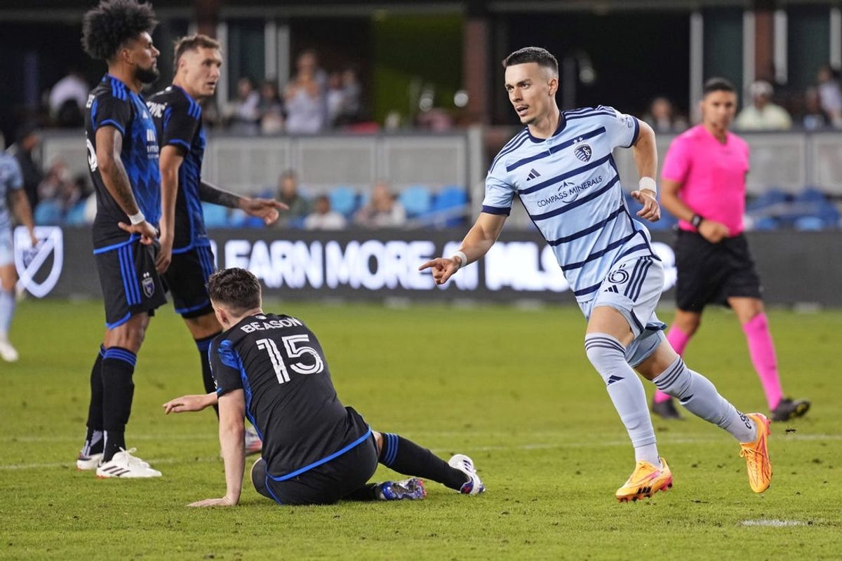Jul 13, 2024; San Jose, California, USA; Sporting Kansas City midfielder Erik Thommy (26) celebrates after scoring a goal during the first half San Jose Earthquakes  at PayPal Park. Mandatory Credit: Darren Yamashita-USA TODAY Sports