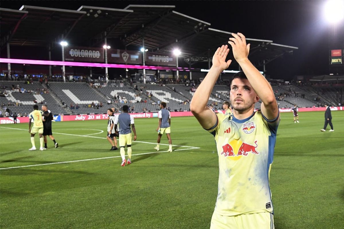 Jul 13, 2024; Commerce City, Colorado, USA; New York Red Bulls midfielder Lewis Morgan (9) signals to fans after the match against the Colorado Rapids at Dick's Sporting Goods Park. Mandatory Credit: Christopher Hanewinckel-USA TODAY Sports