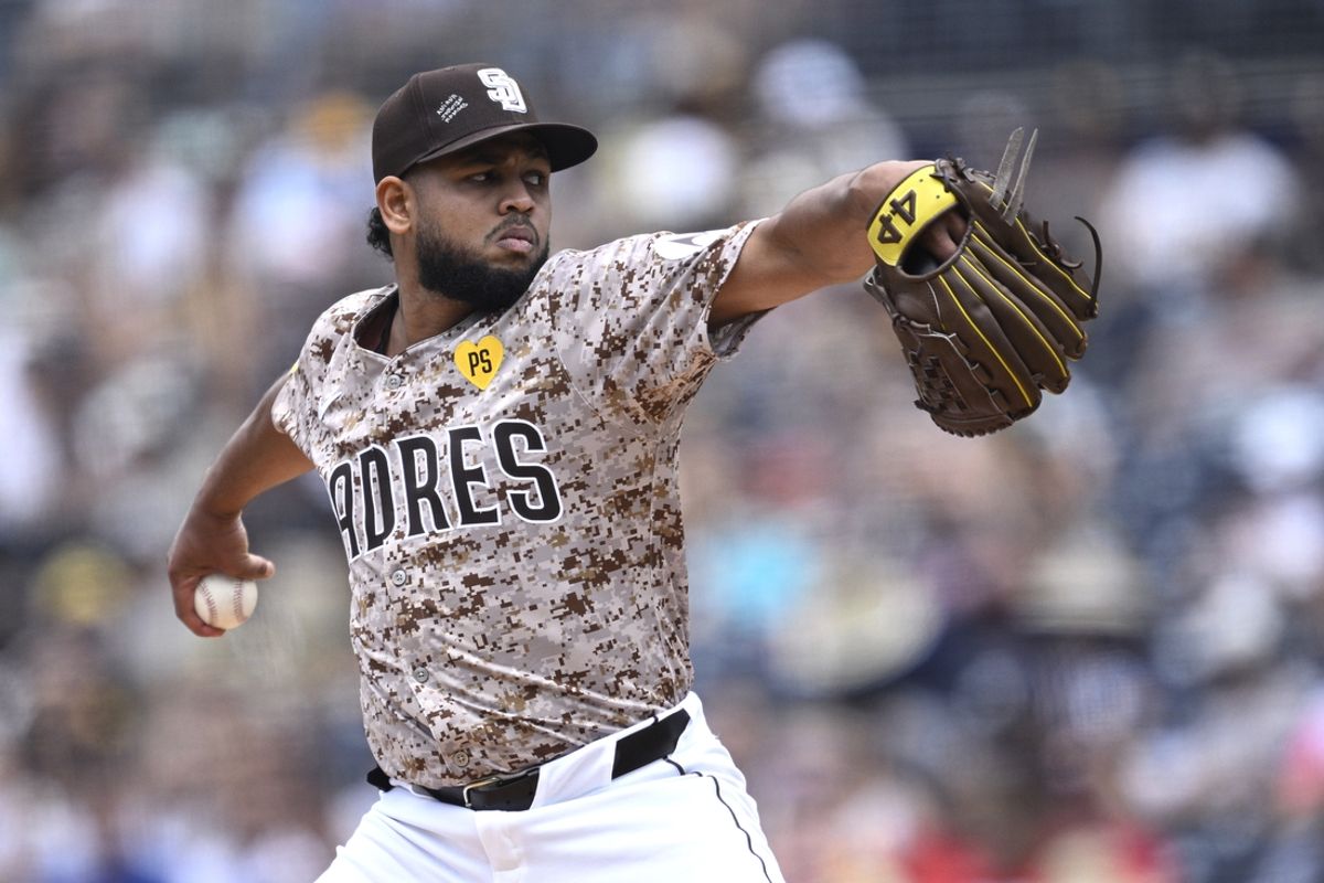 Jul 14, 2024; San Diego, California, USA; San Diego Padres starting pitcher Randy Vasquez (98) pitches against the Atlanta Braves during the first inning at Petco Park. Mandatory Credit: Orlando Ramirez-USA TODAY Sports