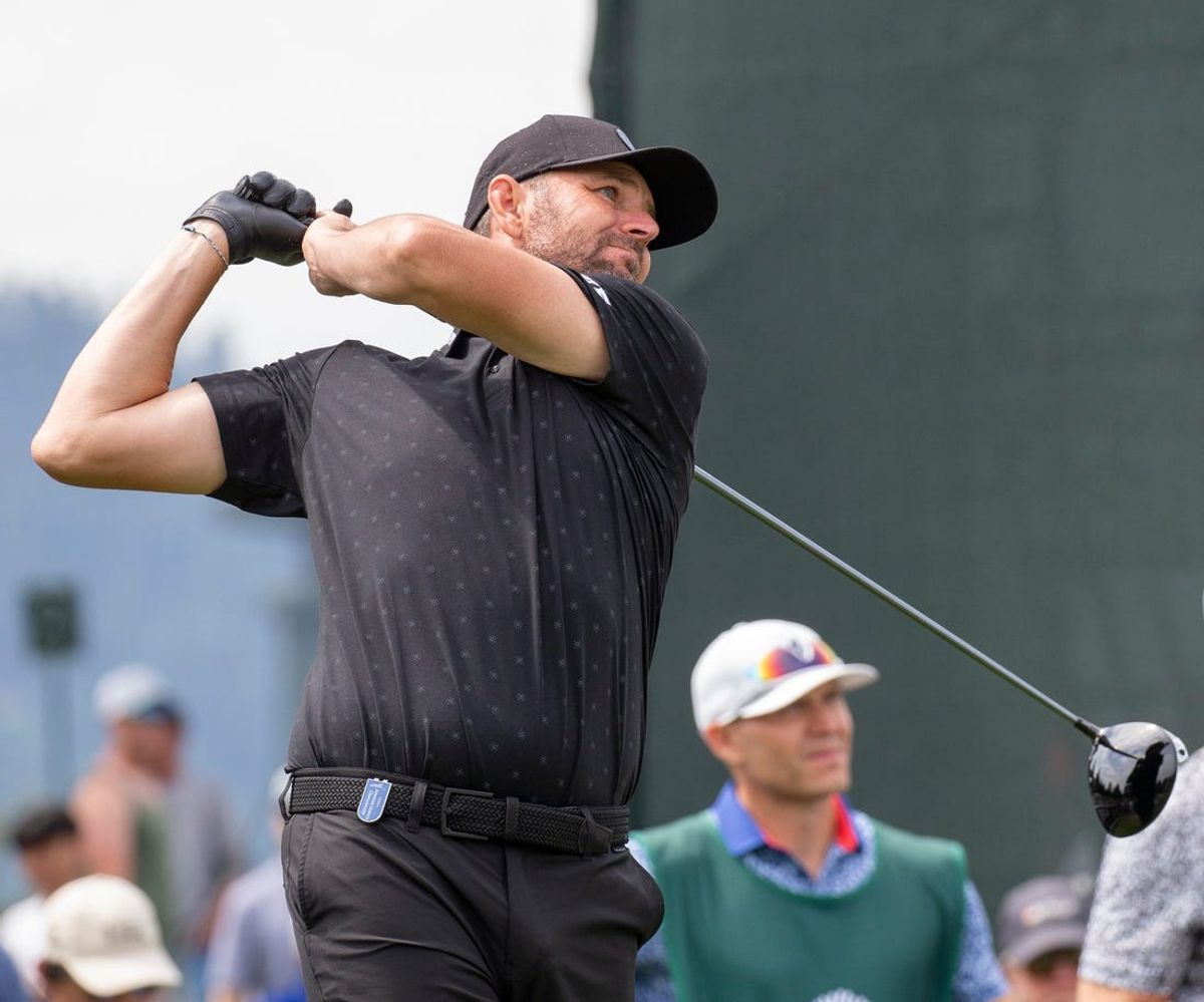 Mardy Fish hits a tee shot on the 17th hole during the final round of the American Century Celebrity Championship golf tournament at Edgewood Tahoe Golf Course in Stateline, Nev., Sunday, July 14, 2024.