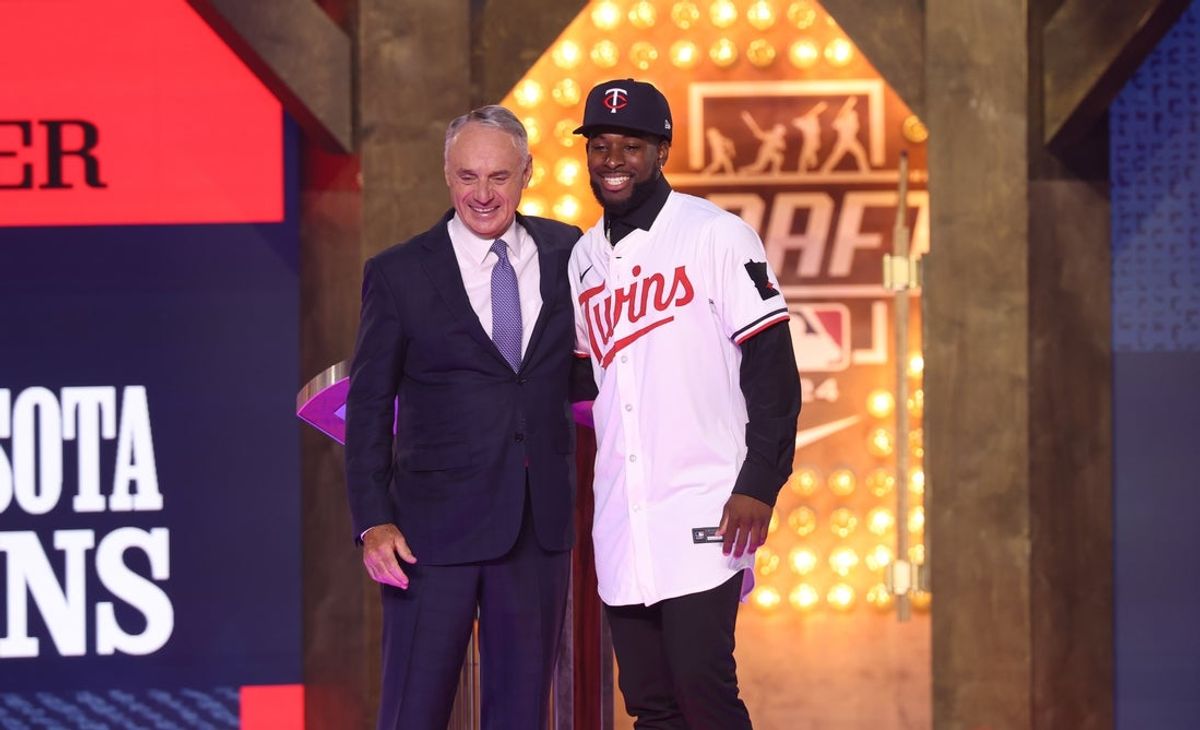 Jul 14, 2024; Ft. Worth, TX, USA;  MLB Commissioner Rob Manfred takes a photo with Kaelen Culpepper after he was drafted by the Minnesota Twins with the 21st pick during the first round of the MLB Draft at Cowtown Coliseum. Mandatory Credit: Kevin Jairaj-Imagn Images