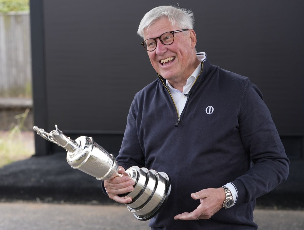 Jul 15, 2024; Ayrshire, SCT; R&A chief executive Martin Slumbers after receiving the Claret Jug from 2023 British Open champion Brian Harman at the Open Championship golf tournament at Royal Troon on Monday, July 15, 2024. Mandatory Credit: Jack Gruber-USA TODAY Sports