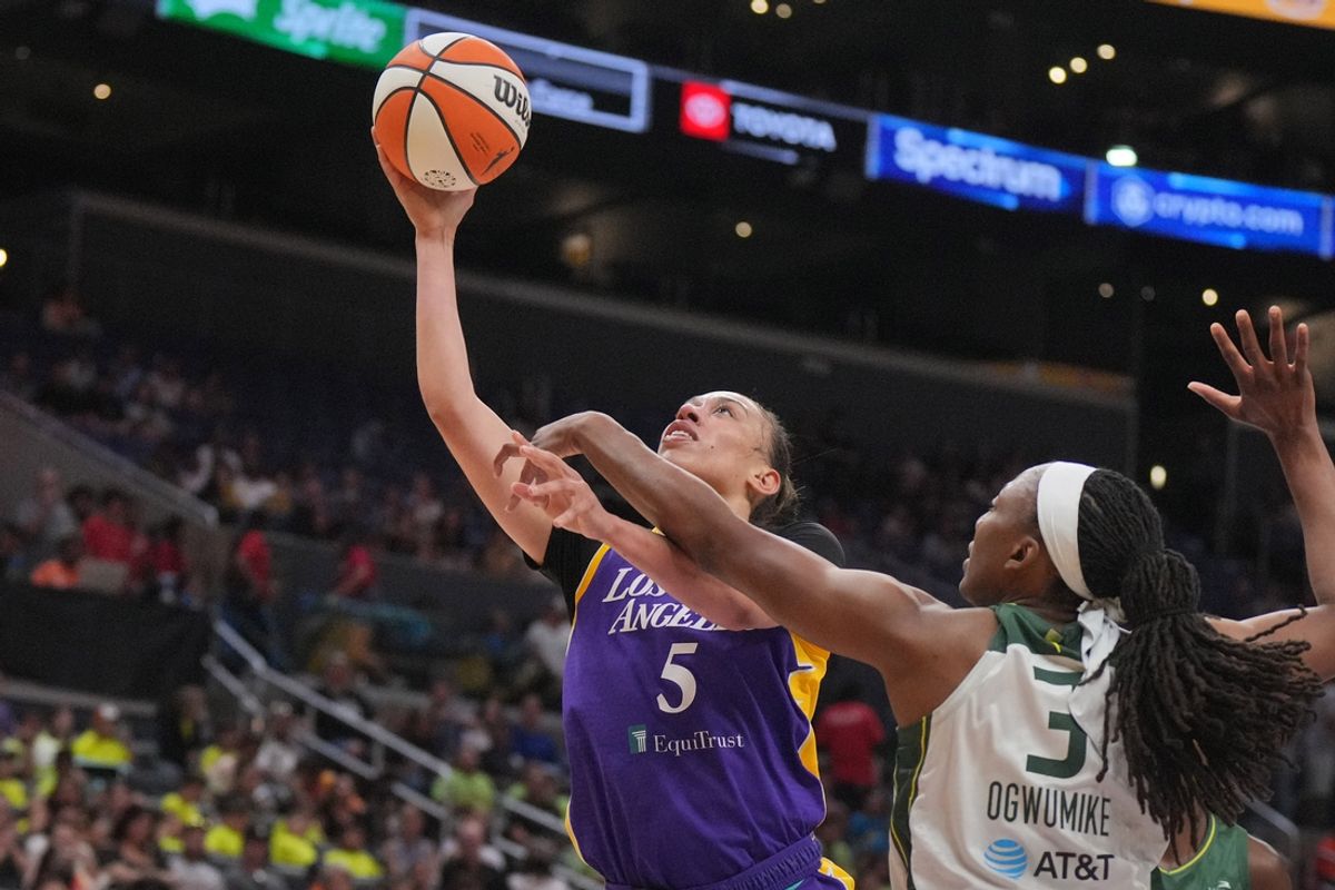Jul 16, 2024; Los Angeles, California, USA; LA Sparks forward Dearica Hamby (5) shoots the ball against Seattle Storm forward Nneka Ogwumike (3) in the first half at Crypto.com Arena. Mandatory Credit: Kirby Lee-USA TODAY Sports