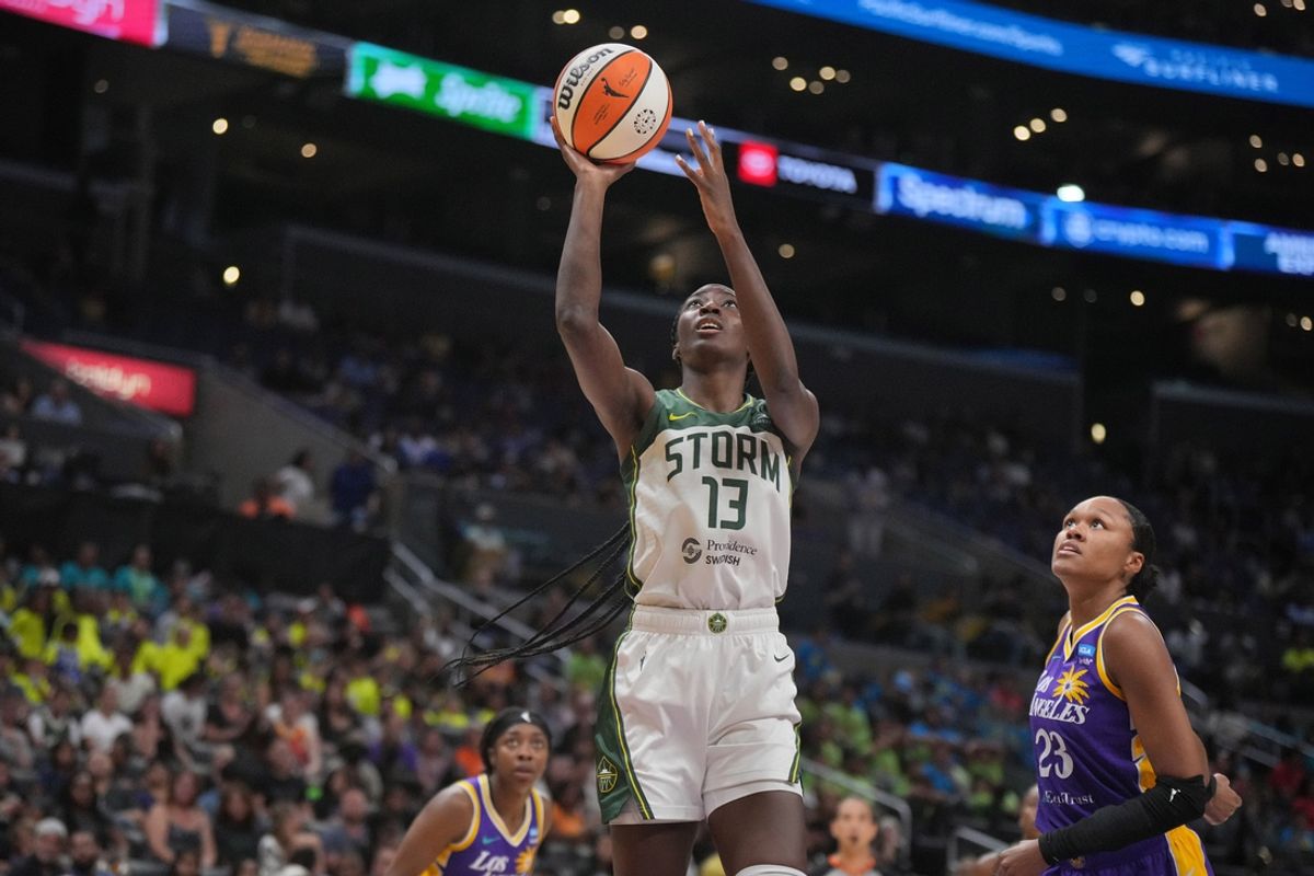 Jul 16, 2024; Los Angeles, California, USA; Seattle Storm center Ezi Magbegor (13) shoots the ball against LA Sparks forward Azura Stevens (23) in the second half at Crypto.com Arena. Mandatory Credit: Kirby Lee-USA TODAY Sports