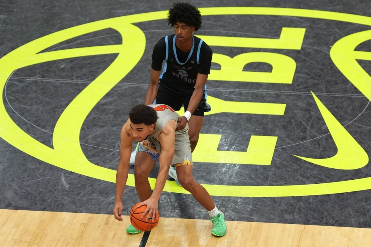 July 17, 2024; North Augusta, S.C., USA; Team Takeover's Derek Dixon (3) moves down the court as WhyNot's Tajh Ariza (2) defends during the Team Takeover and WhyNot game at the Nike Peach Jam at Riverview Park Activities Center. Team Takeover won 64-62. Mandatory Credit: Katie Goodale-USA TODAY Network