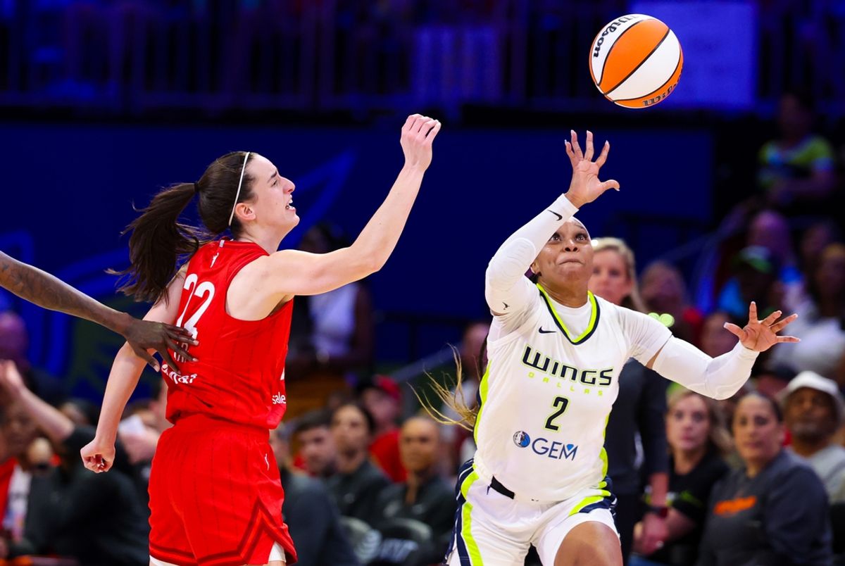 Jul 17, 2024; Arlington, Texas, USA; Dallas Wings guard Odyssey Sims (2) steals the ball from Indiana Fever guard Caitlin Clark (22) during the first half at College Park Center. Mandatory Credit: Kevin Jairaj-USA TODAY Sports