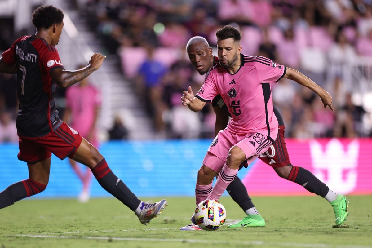 Jul 17, 2024; Fort Lauderdale, Florida, USA; Inter Miami CF defender Jordi Alba (18) kicks the ball against Toronto FC during the second half at Chase Stadium. Mandatory Credit: Nathan Ray Seebeck-USA TODAY Sports
