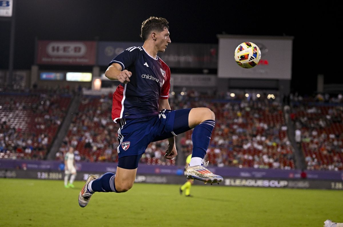 Jul 17, 2024; Frisco, Texas, USA; FC Dallas forward Logan Farrington (23) brings the ball upfield against Austin FC during the second half at Toyota Stadium. Mandatory Credit: Jerome Miron-USA TODAY Sports