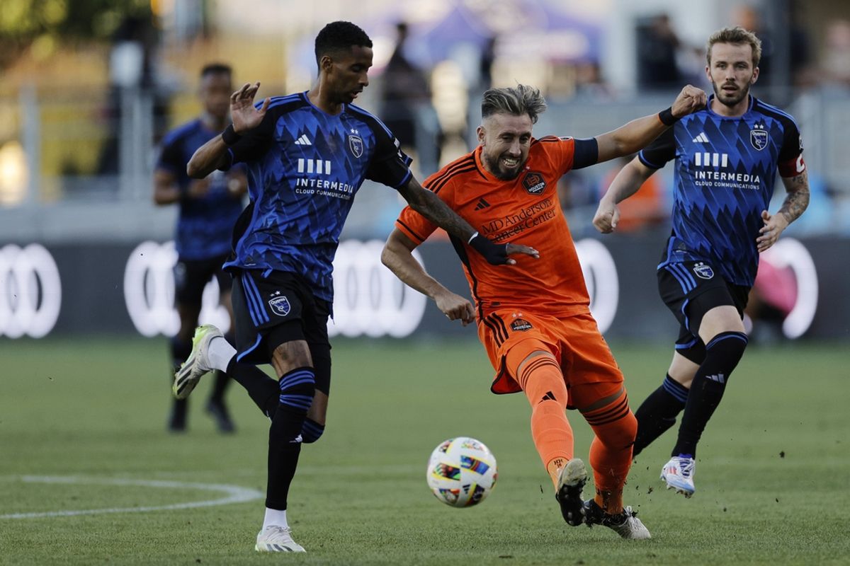 Jul 17, 2024; San Jose, California, USA; San Jose Earthquakes forward Amahl Pellegrino (9) battles Houston Dynamo midfielder Héctor Herrera (16) for the ball in the first half at PayPal Park. Mandatory Credit: Robert Kupbens-USA TODAY Sports
