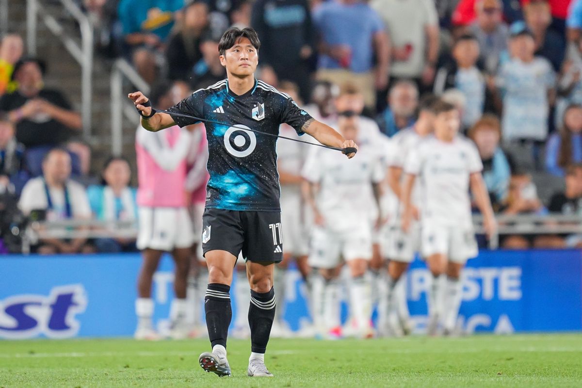 Jul 17, 2024; Saint Paul, Minnesota, USA; Minnesota United forward Sang Bin Jeong (11) untapes his wrist after the D.C. United score in the second half at Allianz Field. Mandatory Credit: Brad Rempel-USA TODAY Sports