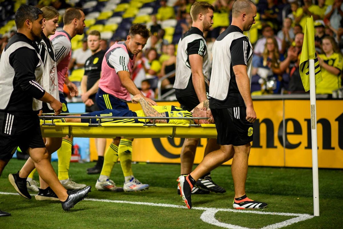 Jul 17, 2024; Nashville, Tennessee, USA; Nashville SC forward Tyler Boyd (11) gets carted off after an injury against the Orlando City SC during the second half at Geodis Park. Mandatory Credit: Steve Roberts-USA TODAY Sports