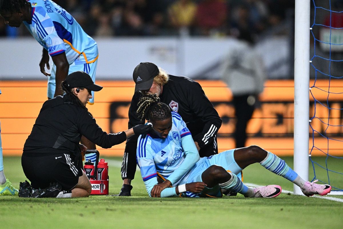 Jul 17, 2024; Carson, California, USA; Colorado Rapids forward Kevin Cabral (91) is checked on by medical staff after a foul in the first half against LA Galaxy at Dignity Health Sports Park. Mandatory Credit: Kelvin Kuo-USA TODAY Sports